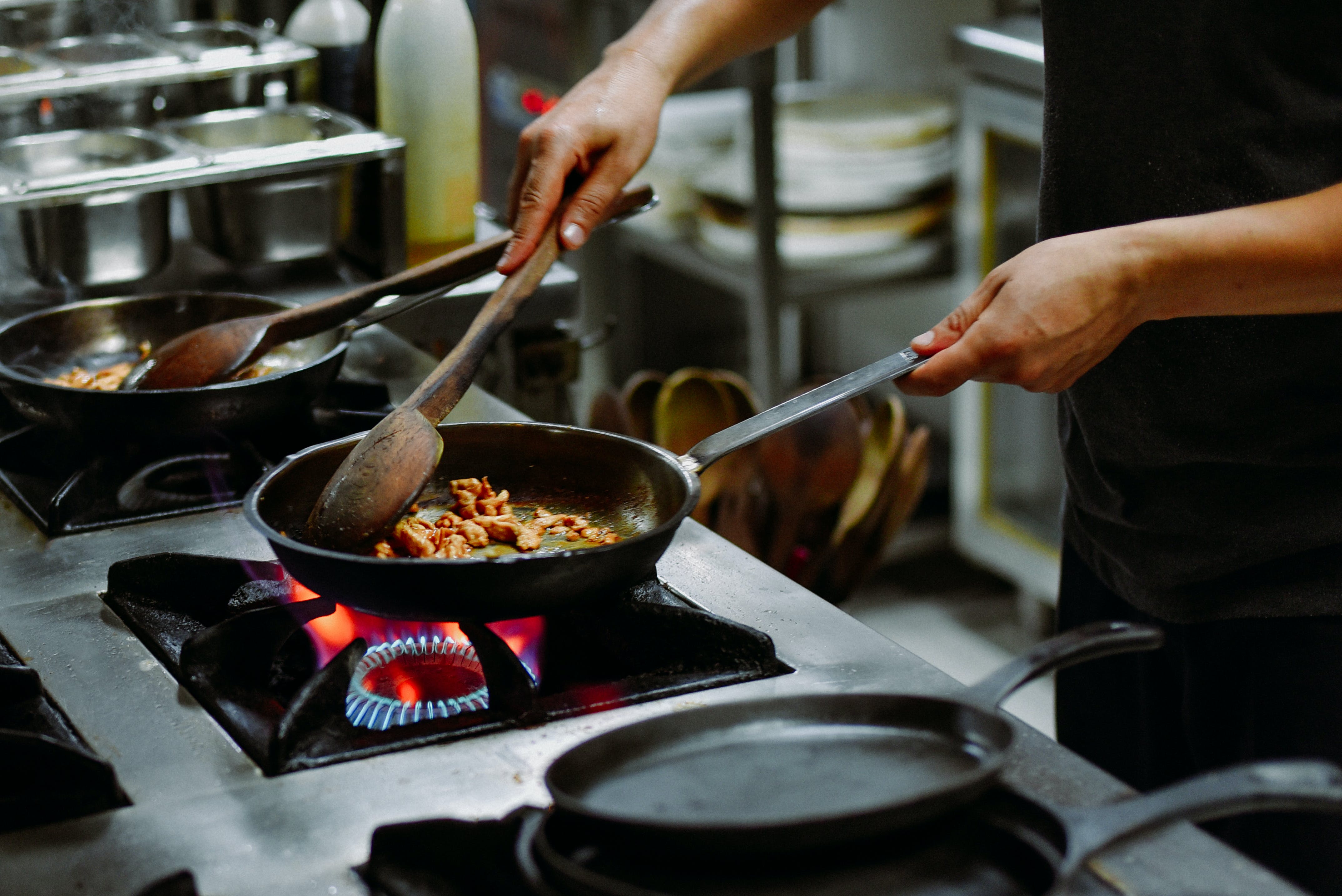 Cooking in a pan.